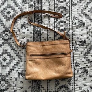 Embossed cross body bag